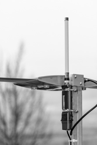 WiFiRanger Elite mounted on a batwing TV antenna.